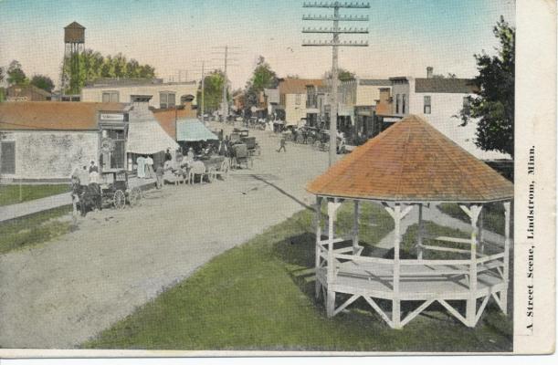 Downtown Lindstrom street scene with water tower, early 1900's.